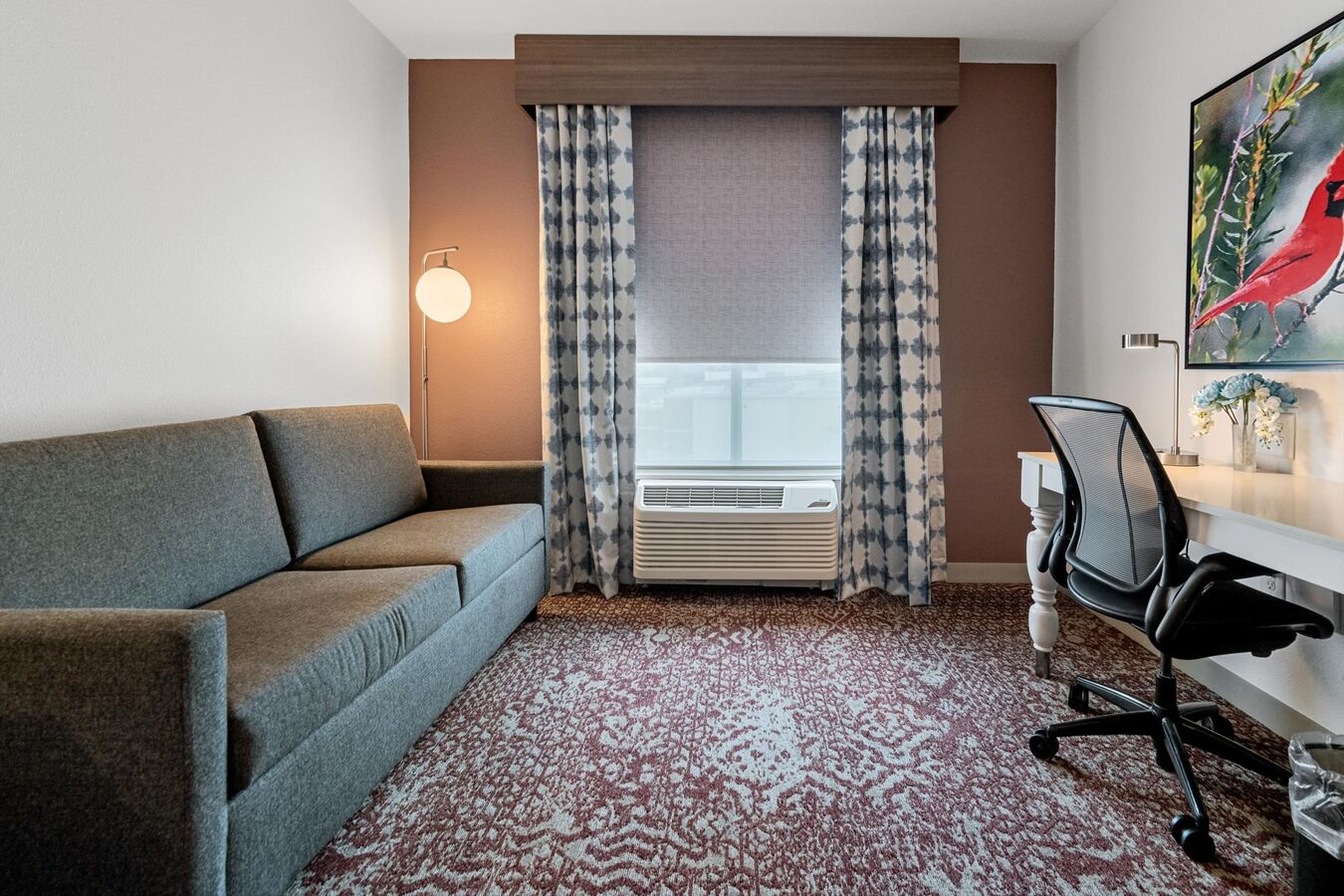 King Guest Room Lounge Area with Sofa and Work Desk