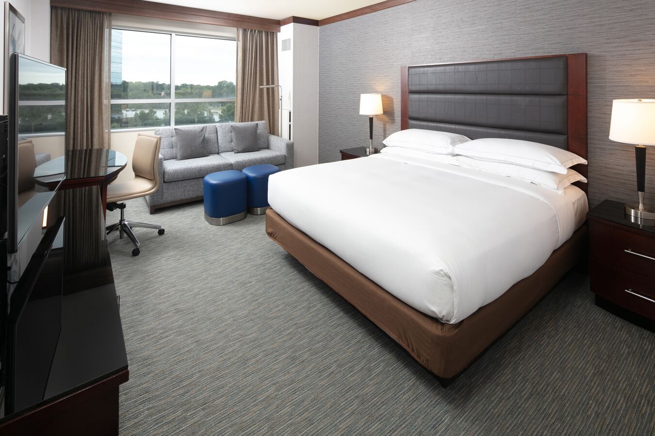 Guest Room with a King sized Bed Sofa and Desk