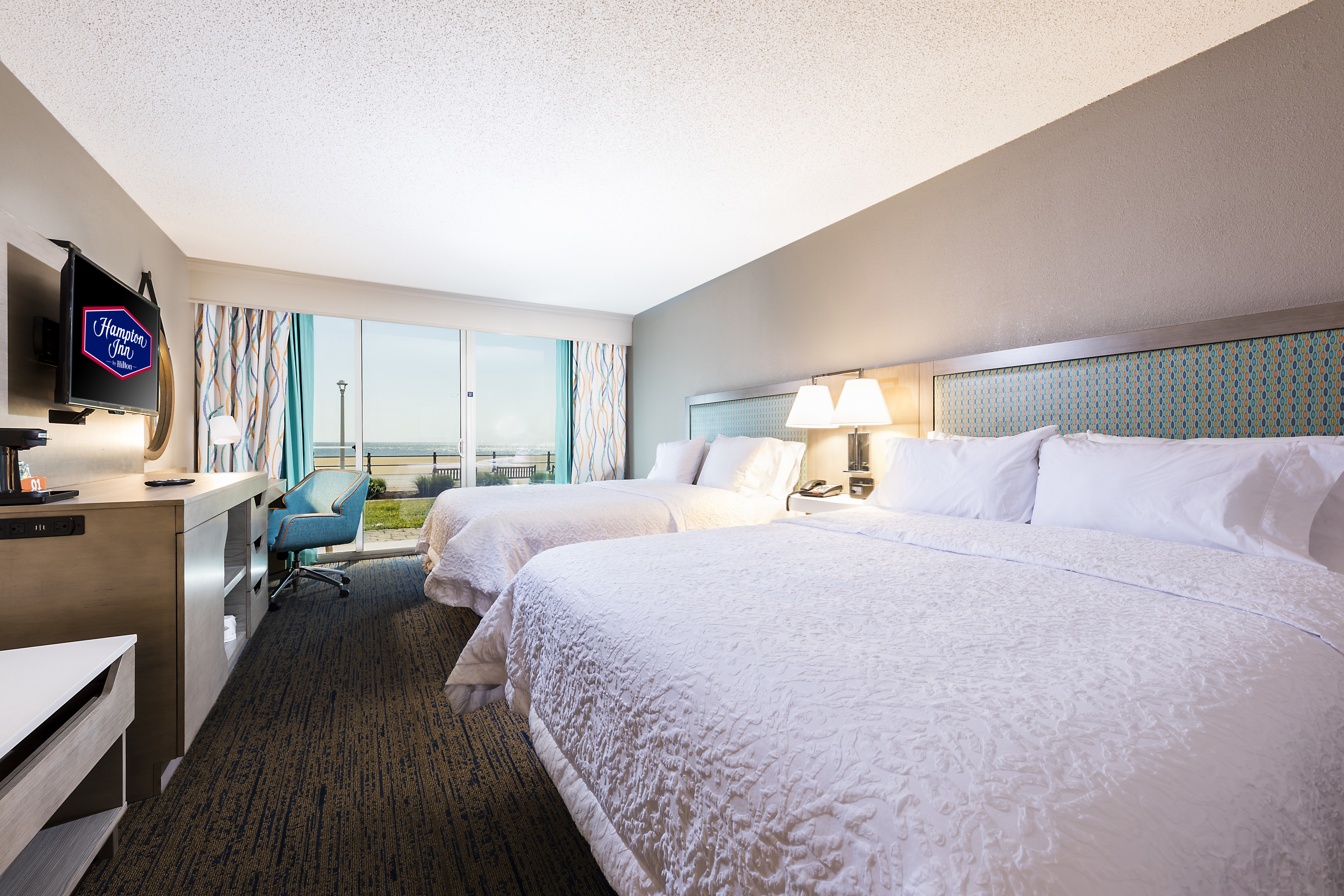 Closeup of Two Queen Beds in Guest Room
