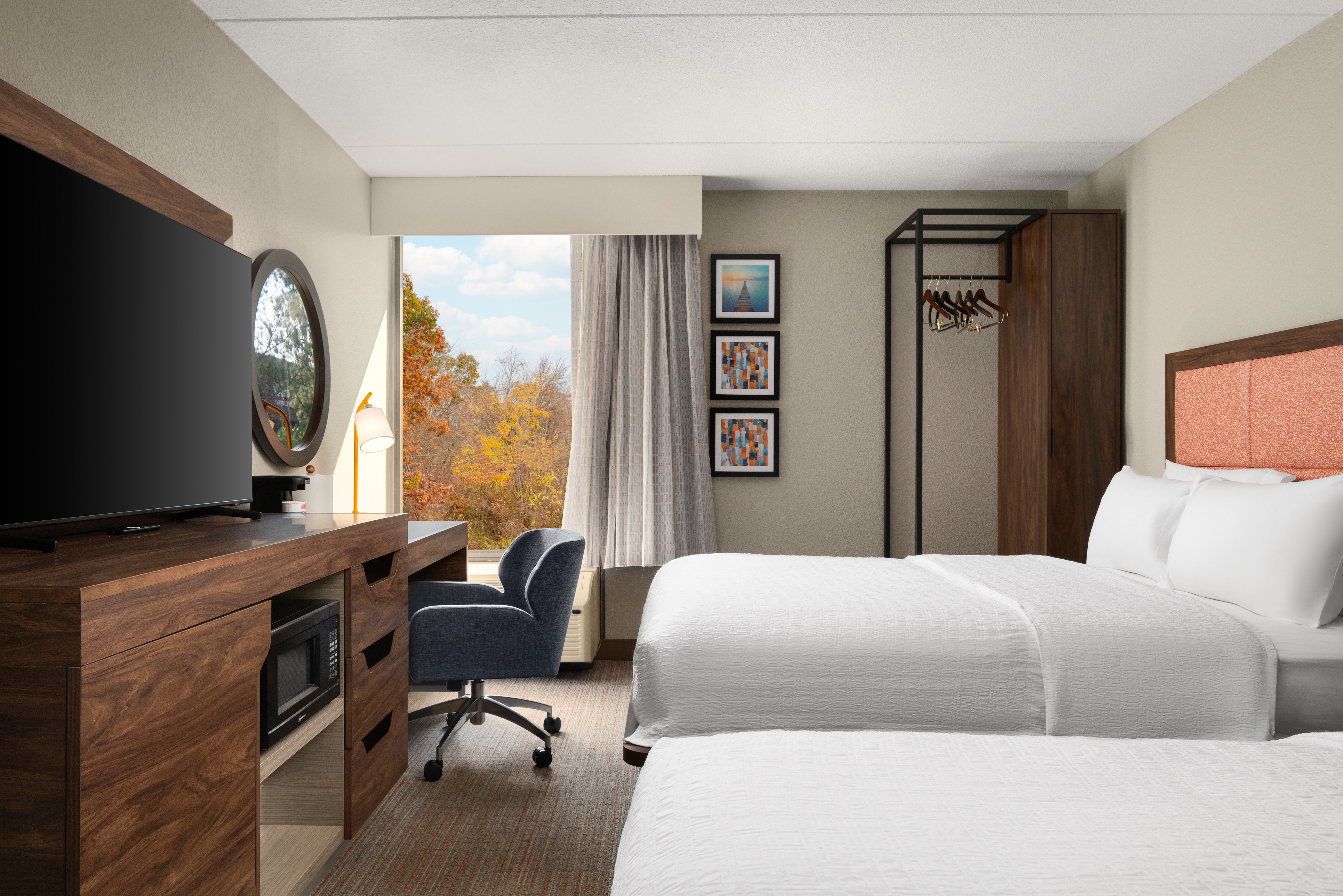 Double bedroom with tv and window