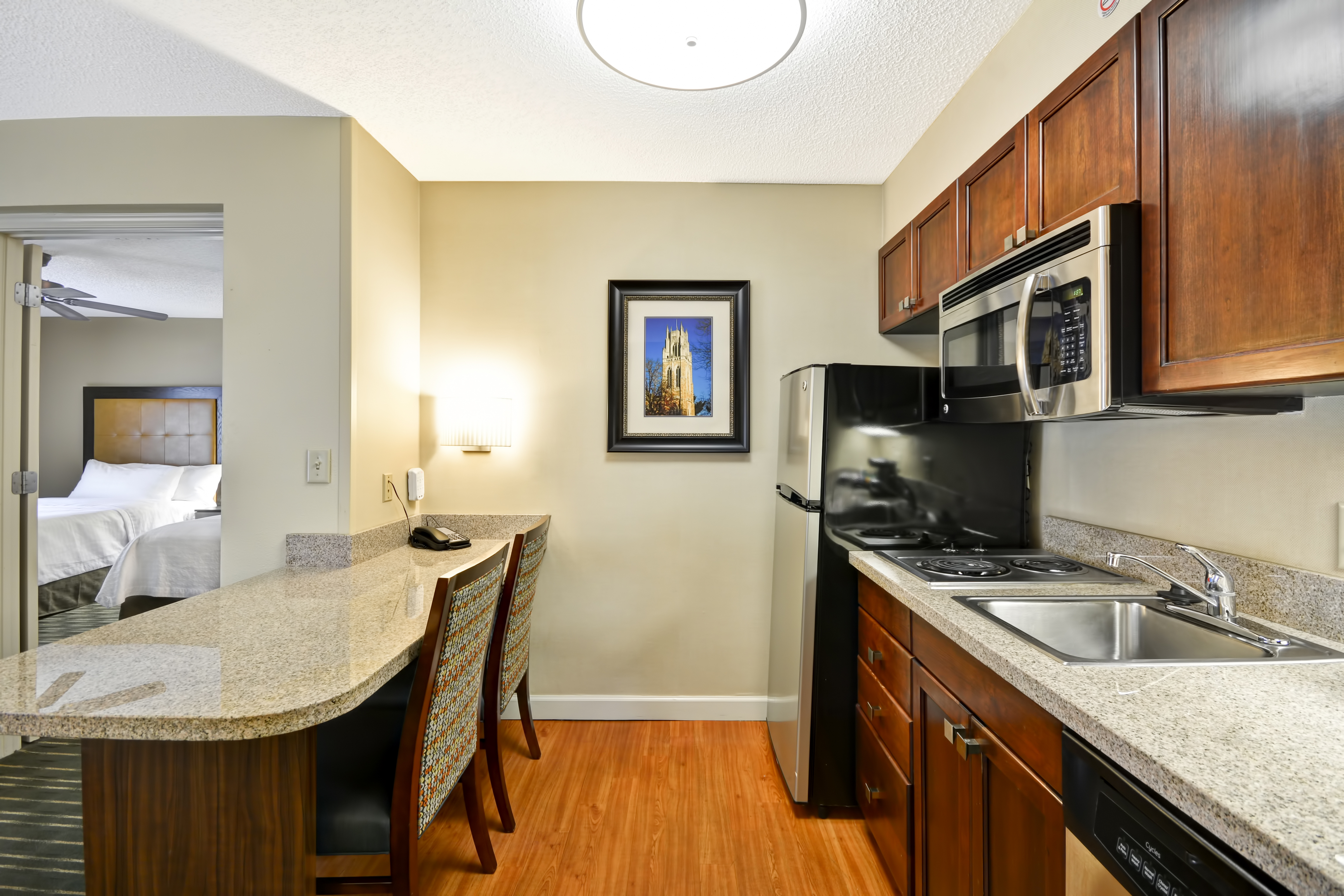 Guest Suite Kitchen Area with Microwave, Refridgerator and Dishwasher