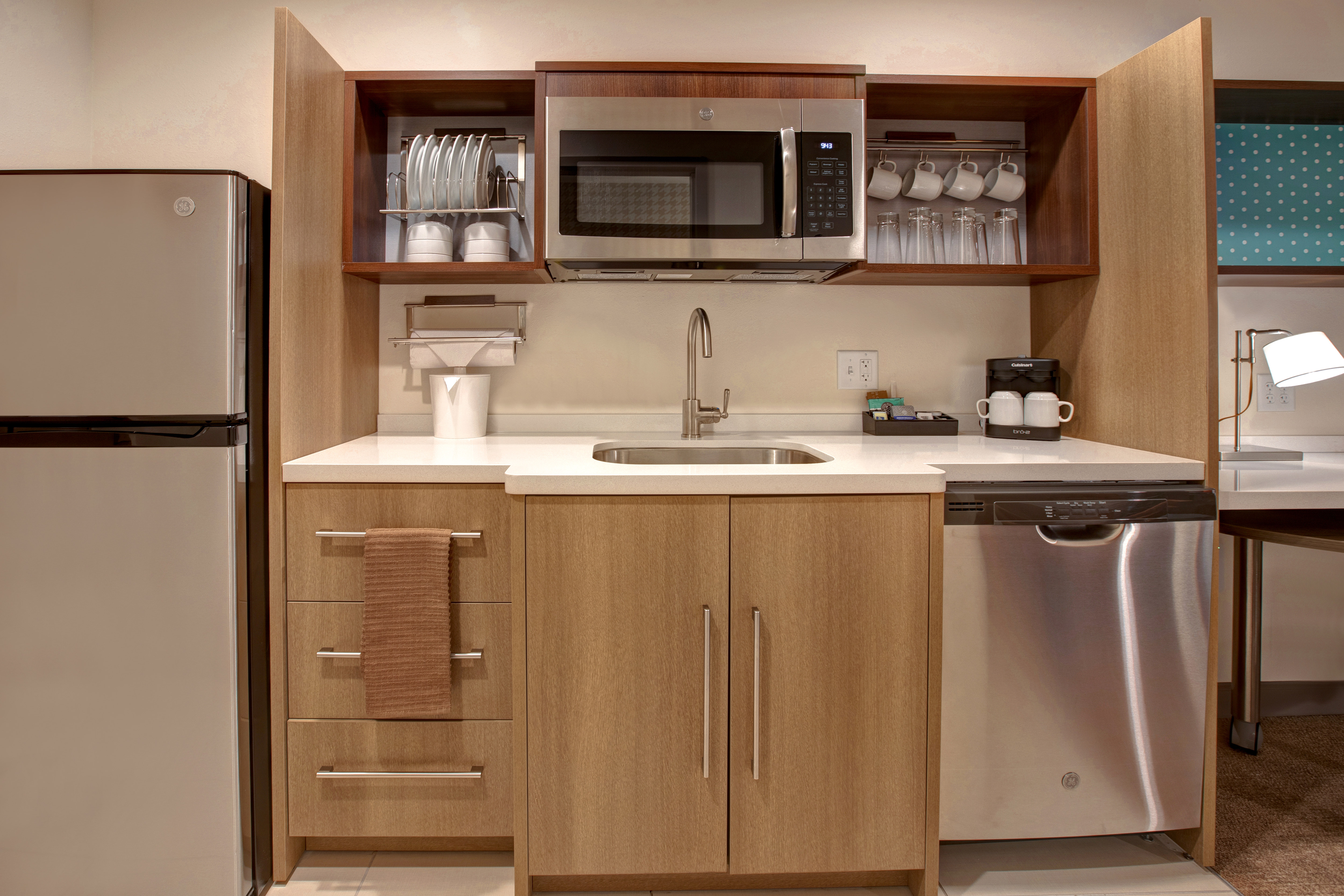 guest room with kitchen and appliances