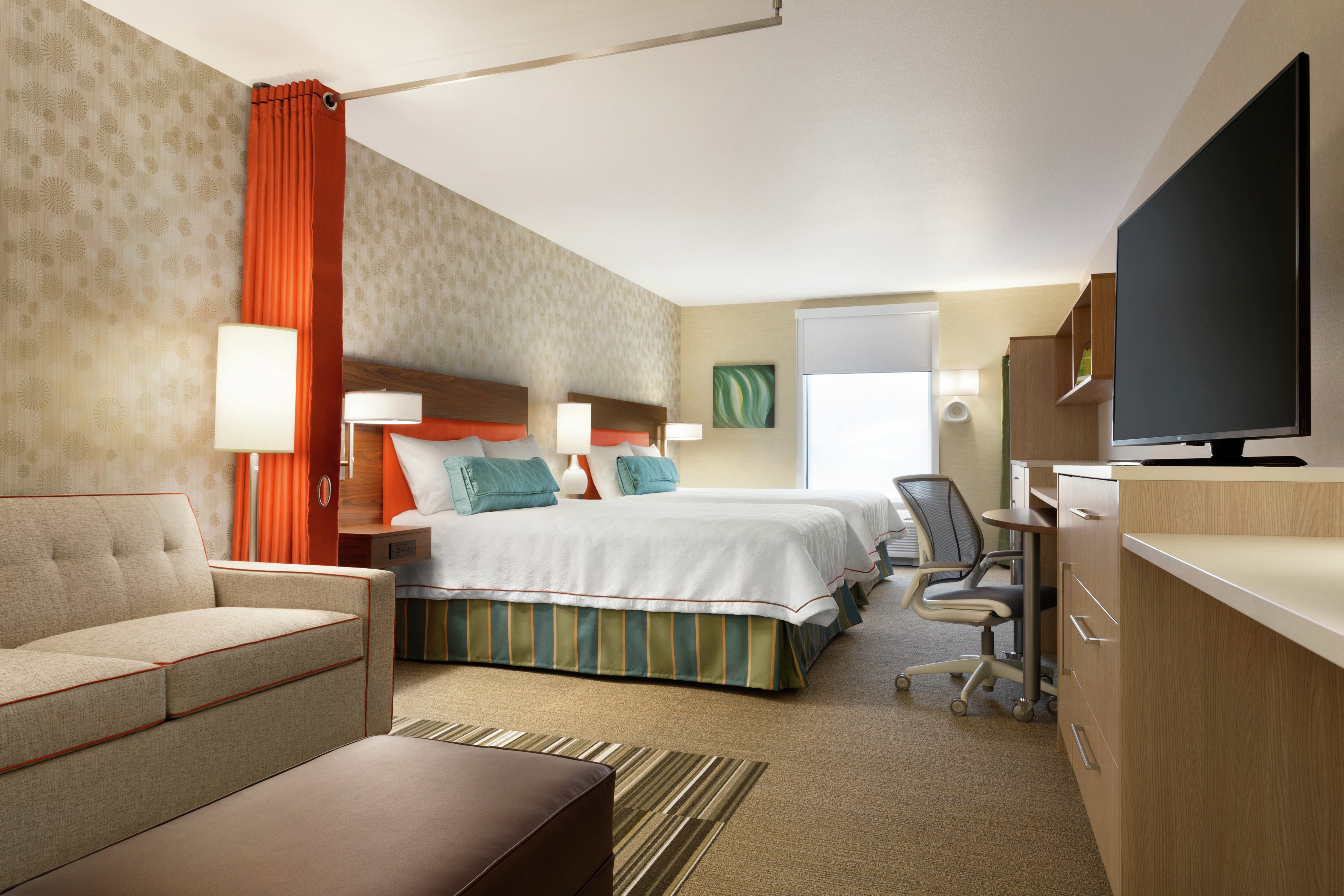 Studio Suite With Two Queen Beds, Sofa Bed, and Work Desk