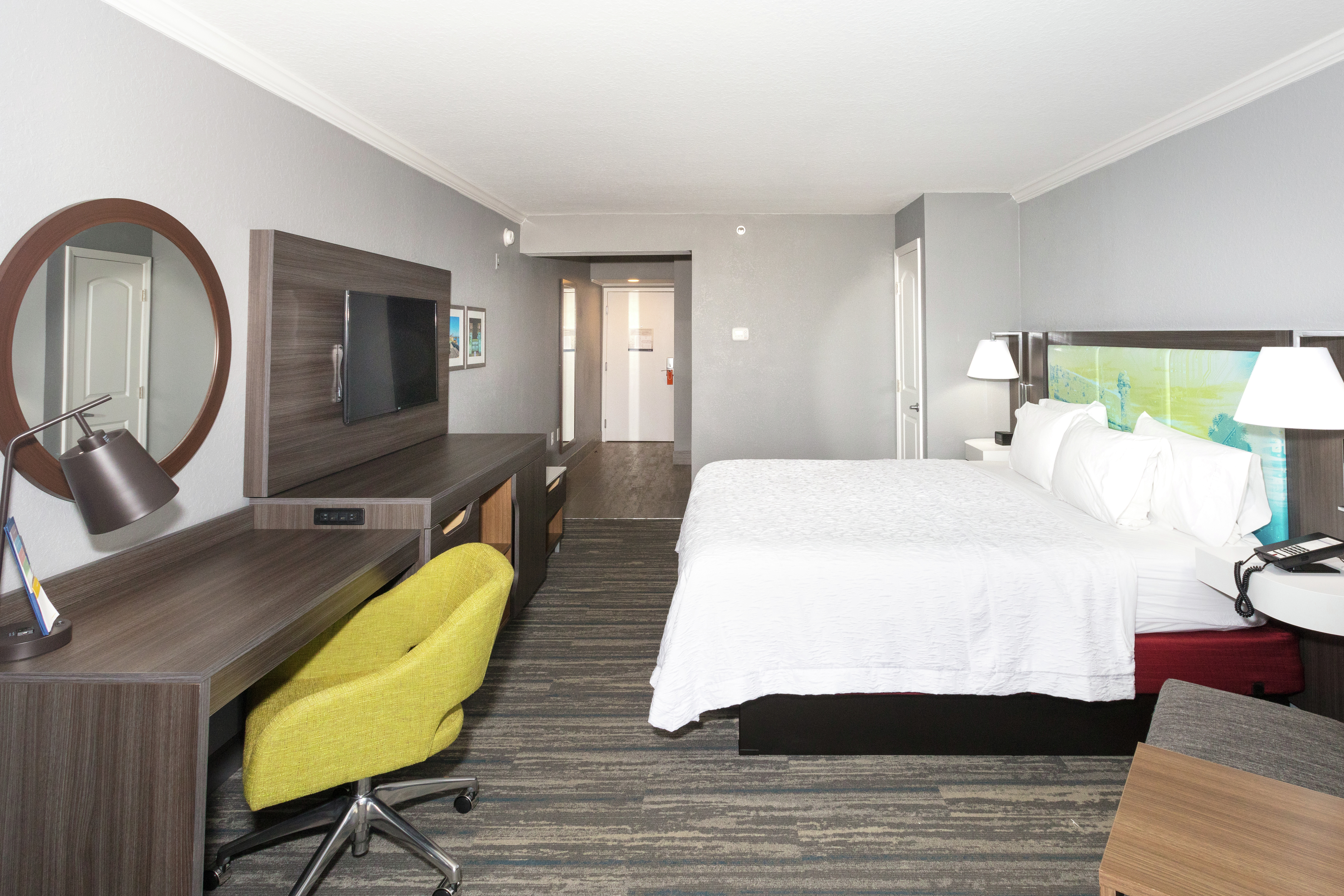 King Bed, Work Desk, and TV in Guest Room
