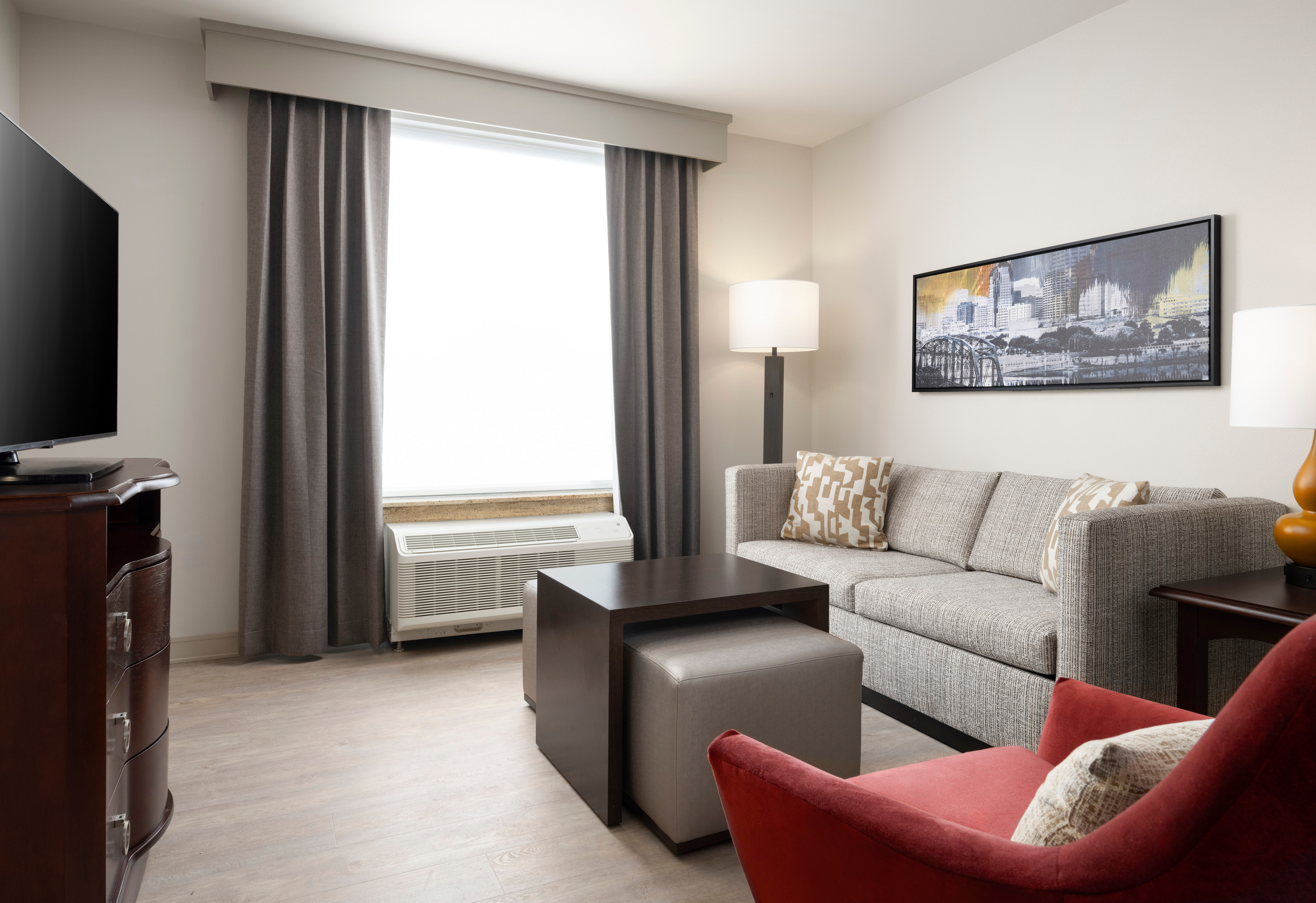 Suite Living Room with Sofa, Chair, and TV
