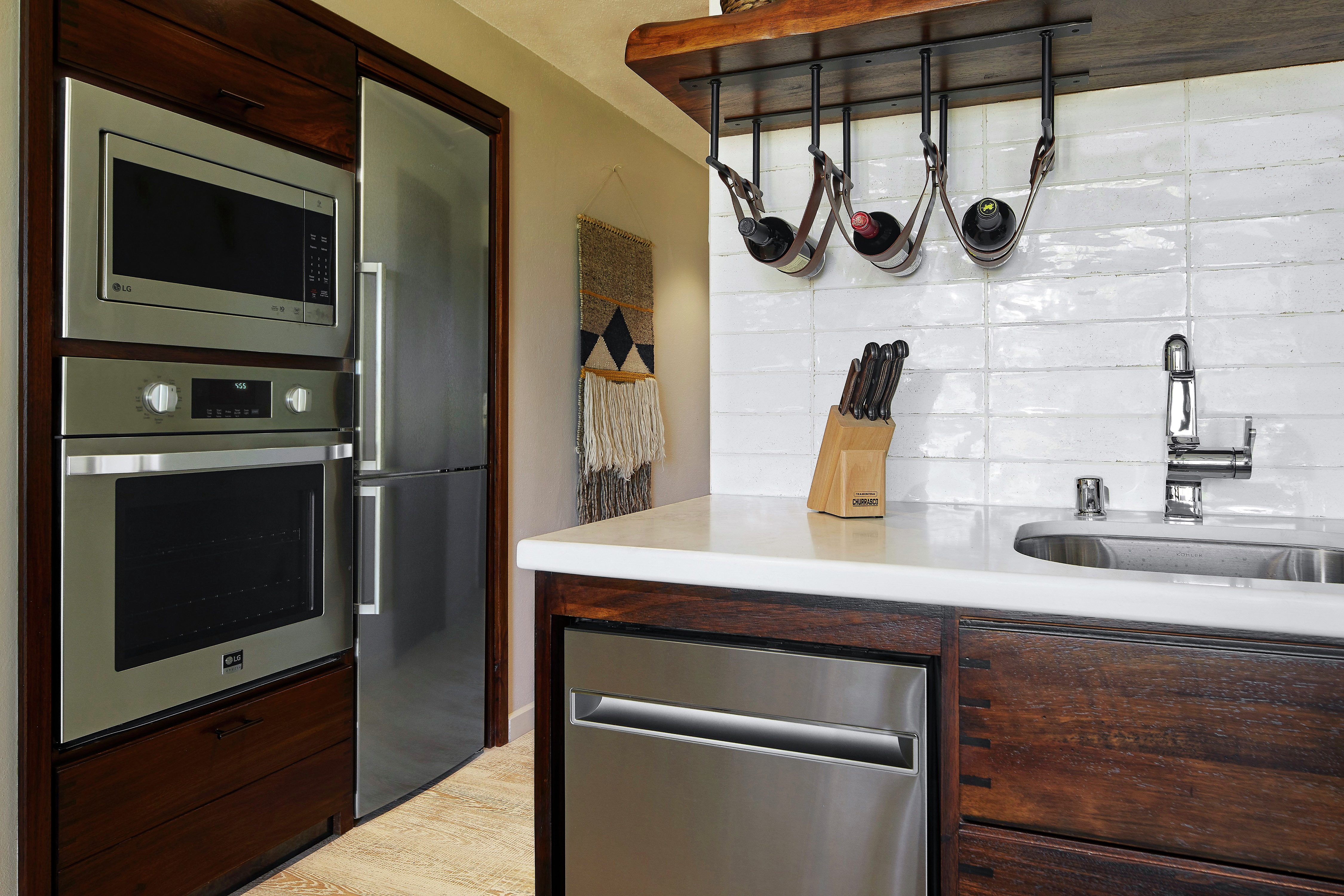 Suite Kitchen with Dishwasher, Oven, Microwave, Full-sized Fridge, Sink and Cutlery