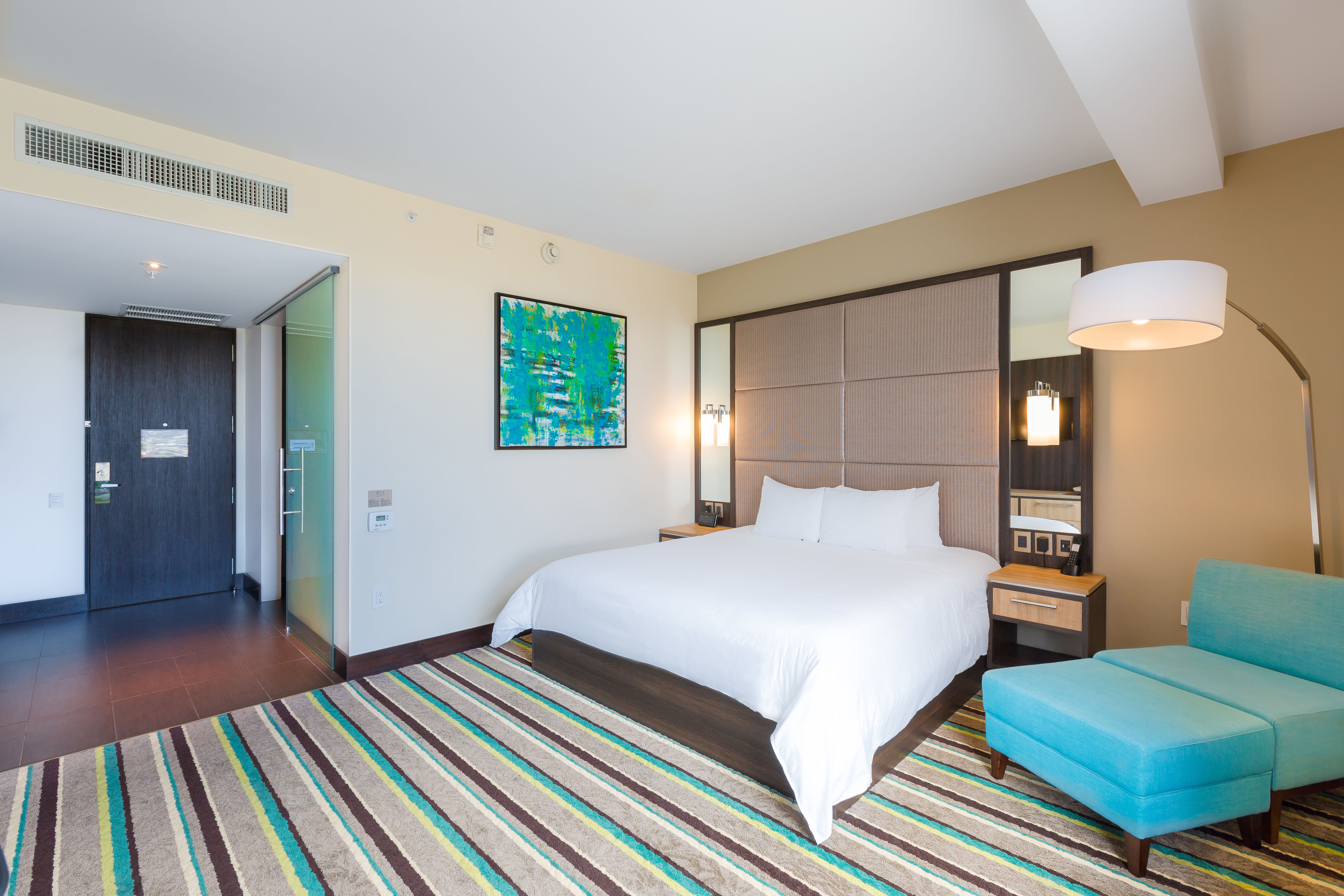 Accessible King Room with Bed and Lounge Chair