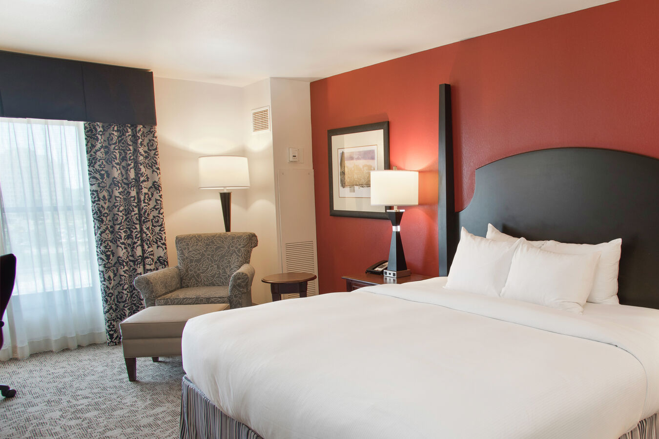 Standard Room with King sized Bed and Chair