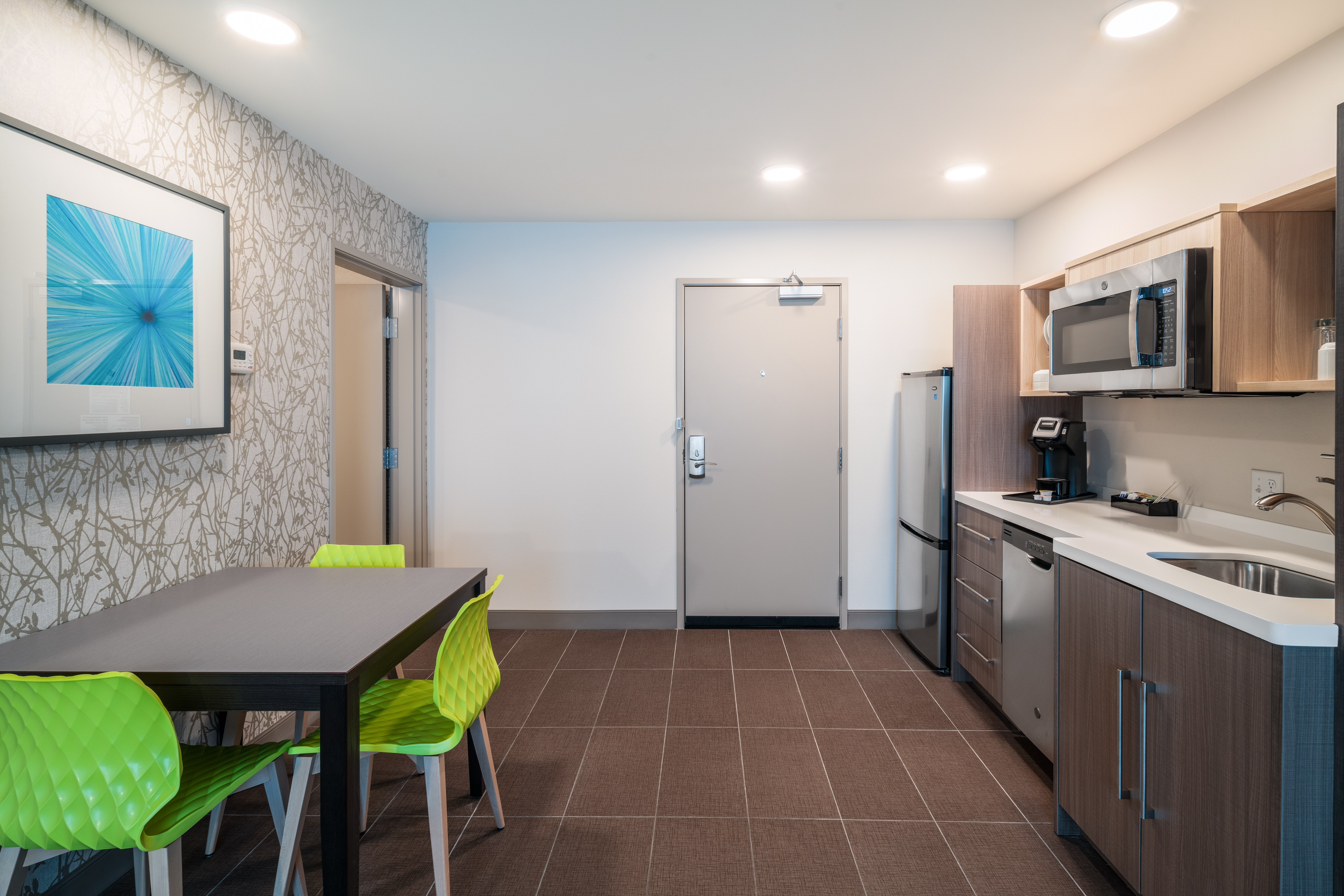 Galley kitchen with dining table