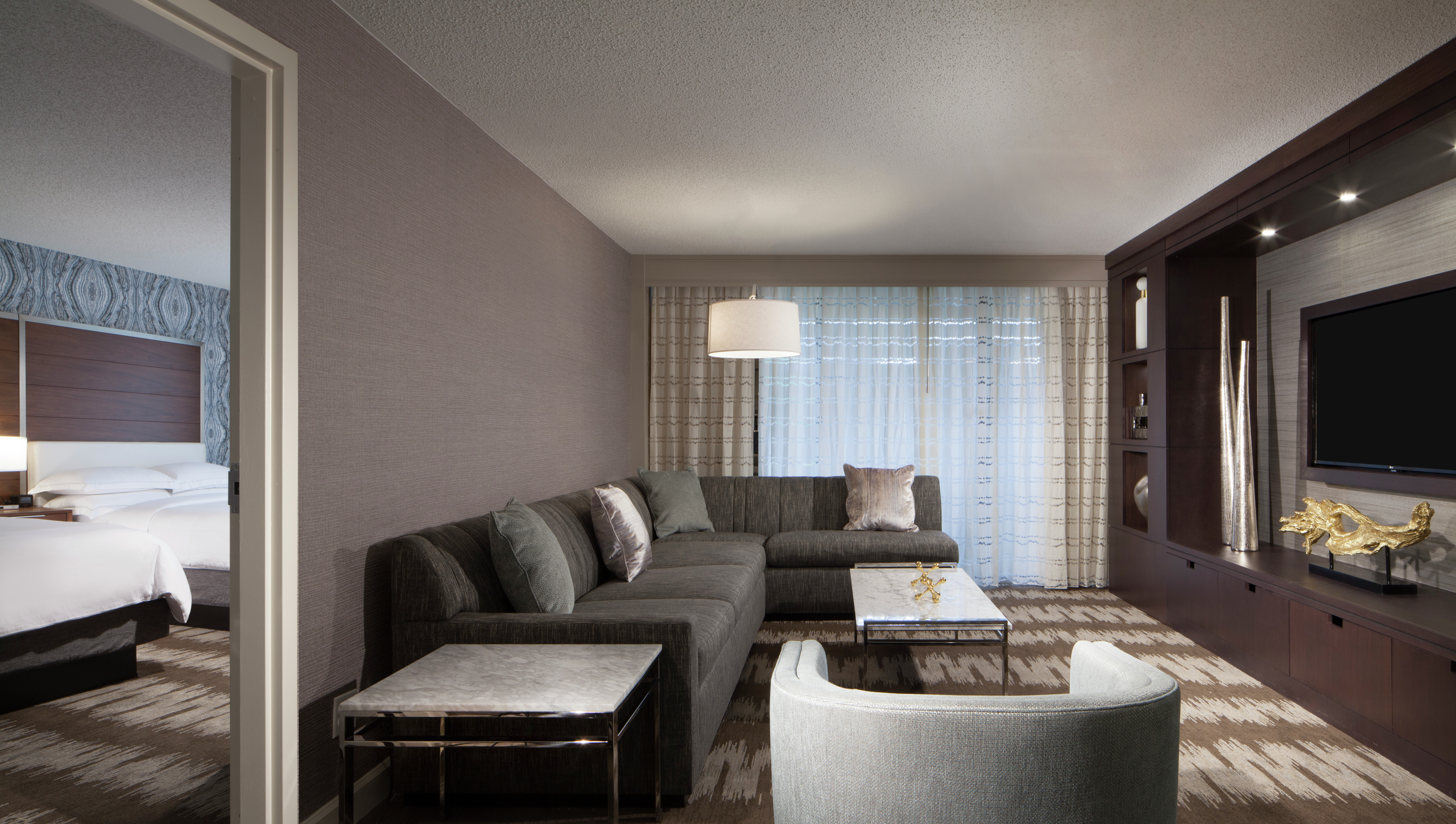 Suite with Lounge Area, Room Technology, and Two Beds
