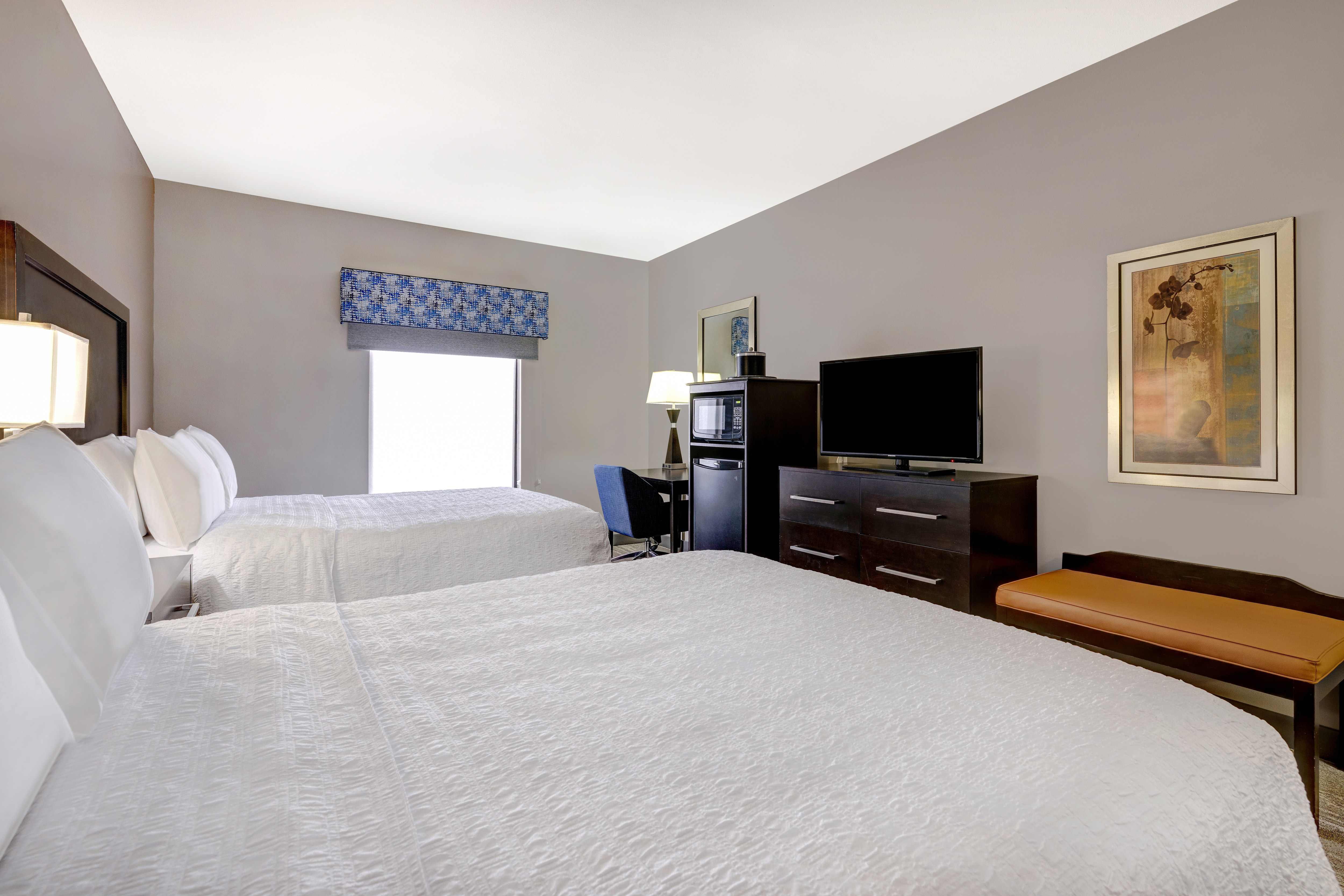 Two Queen Beds, Work Desk, and TV