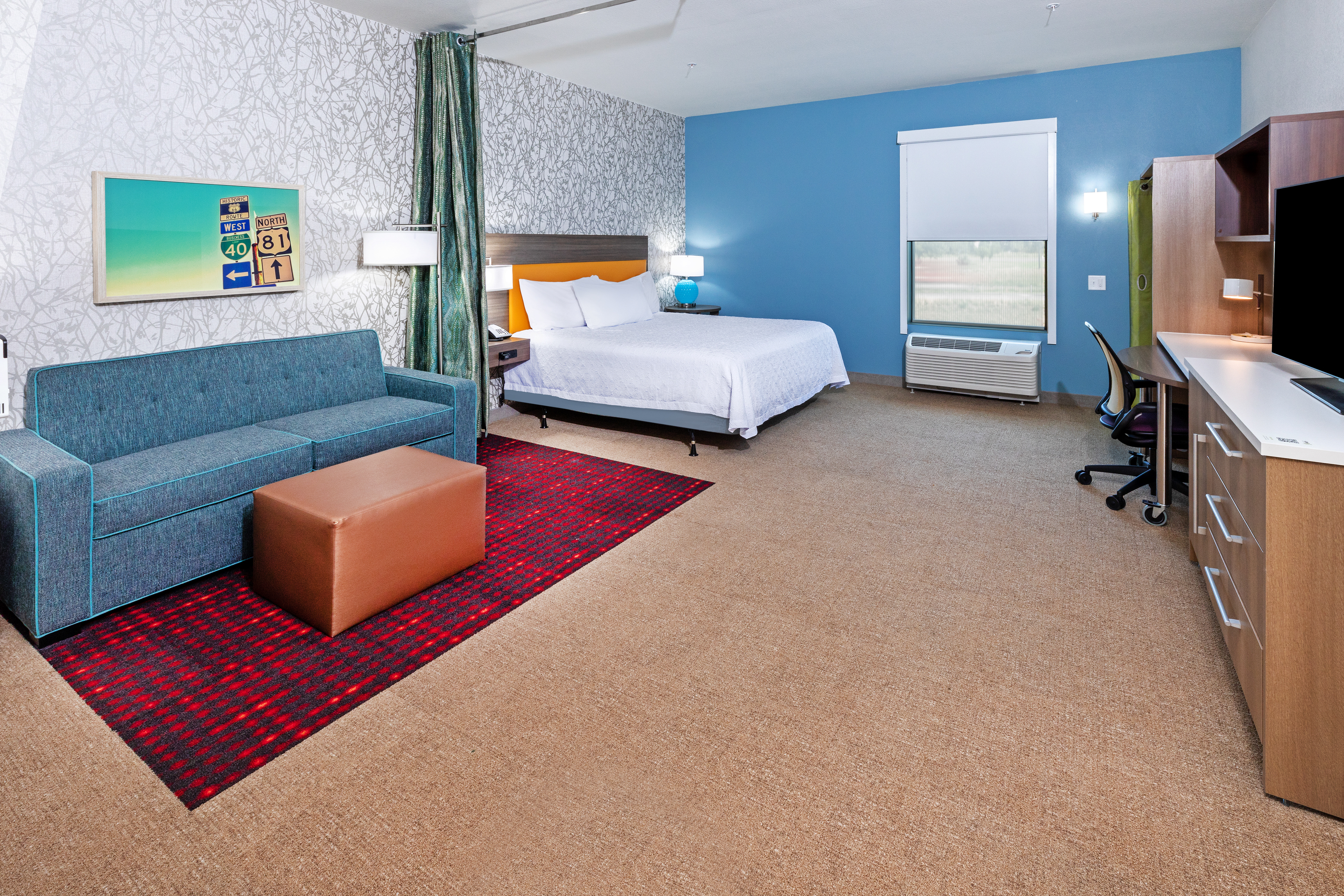 Our spacious rooms offer a separate sitting area
