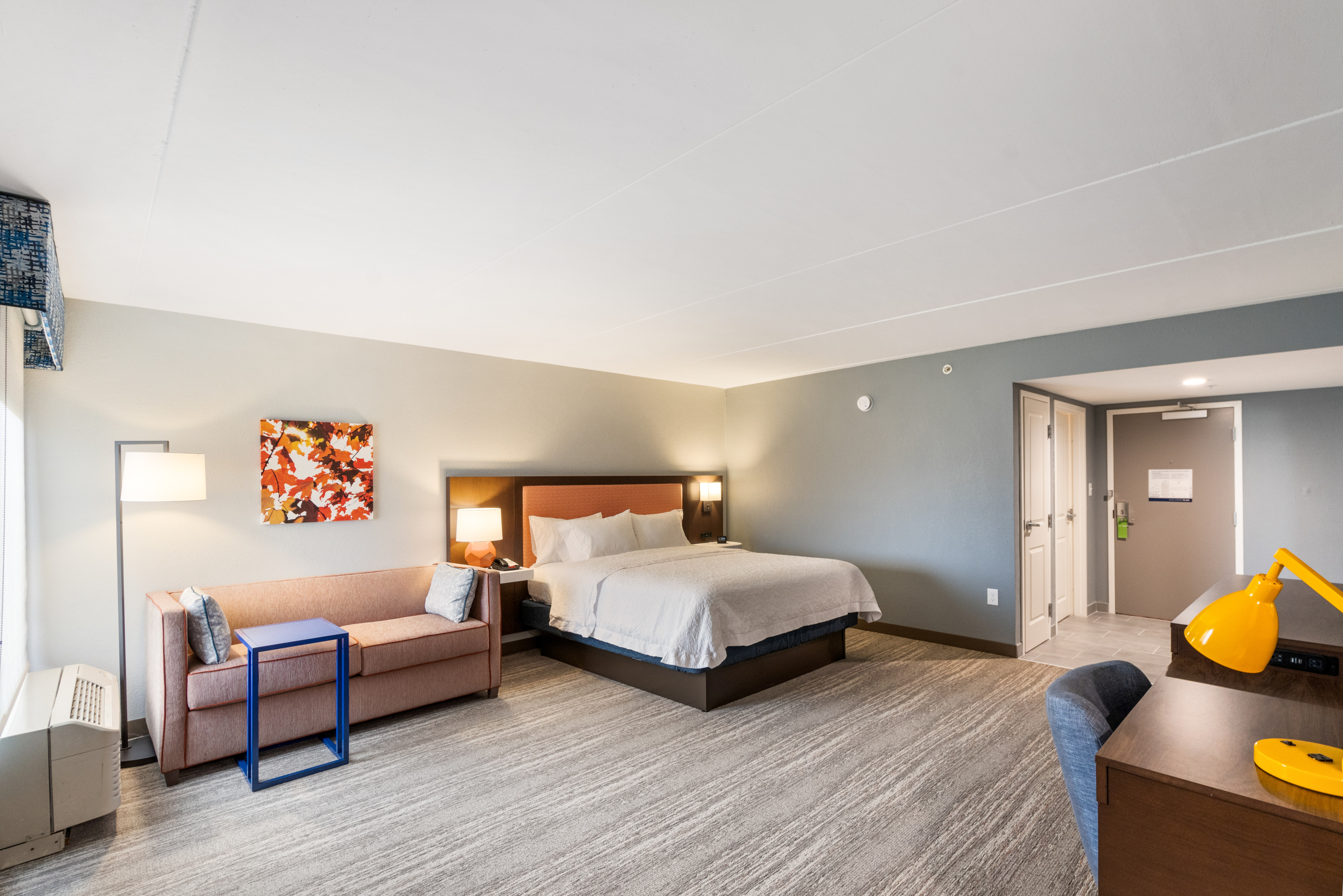 King Guest Room with Sofa Bed and Desk Area