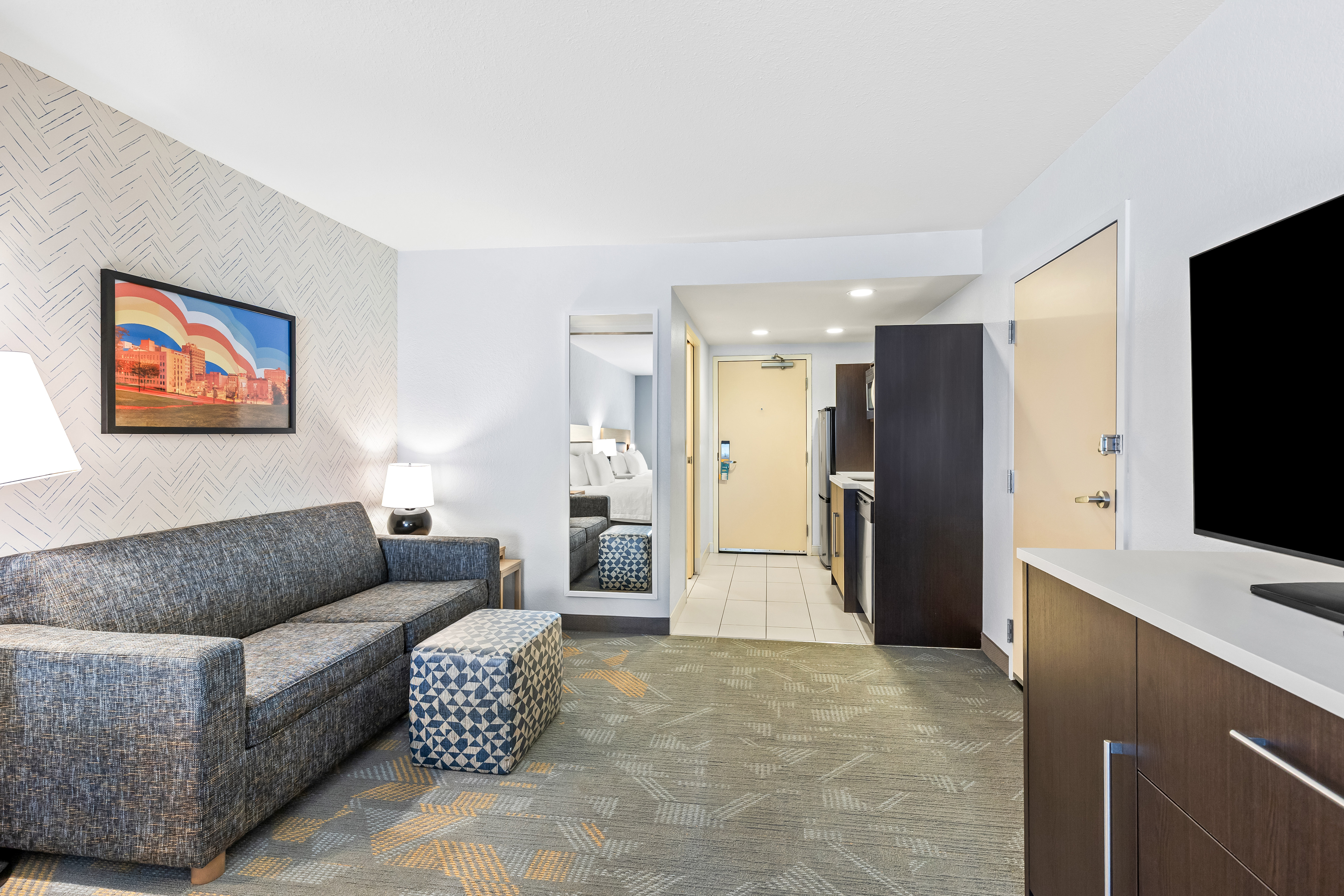 guestroom with couch and entryway