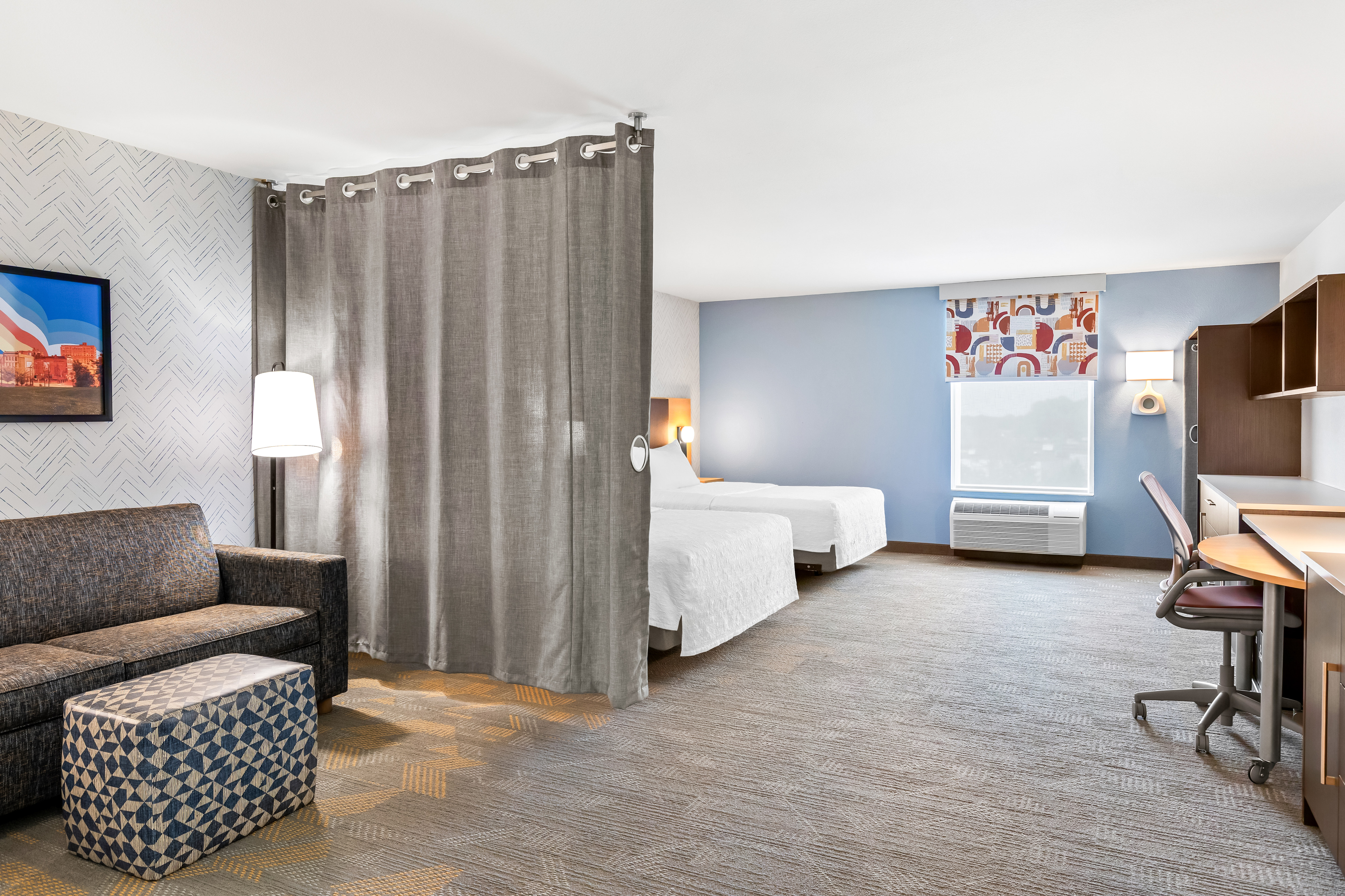 accessible bedroom with couch and double queen beds